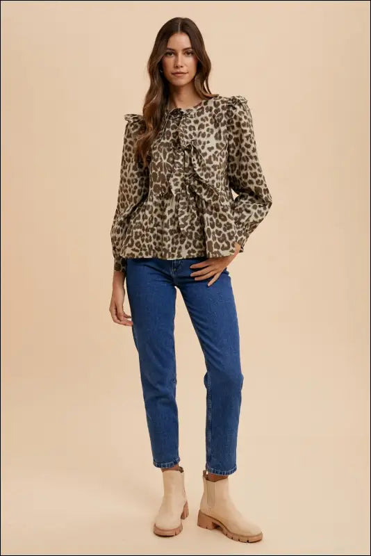 Annie Wear Tied Leopard Round Neck Peplum Blouse