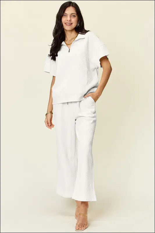 Double Take Full Size Texture Half Zip Short Sleeve Top and Pants Set - White / S